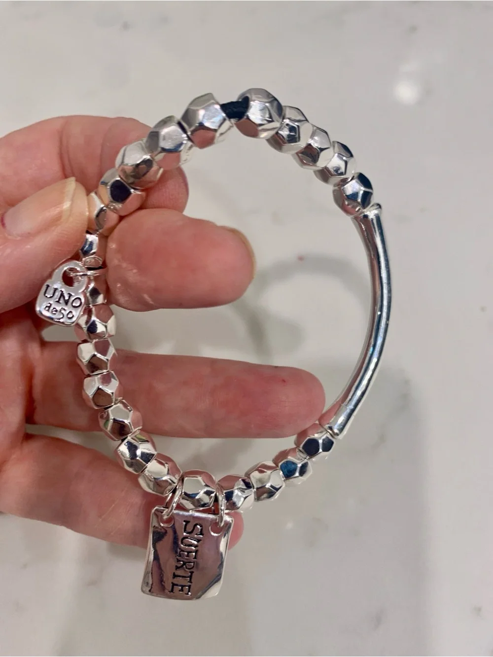 UNO de 50 Silver Faceted Bead Bracelet with SUERTE Charm